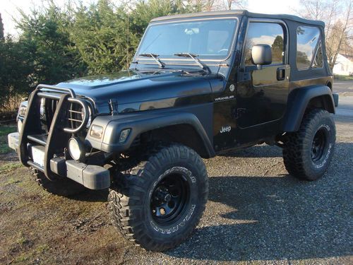 2006 jeep wrangler black, 6 speed manual, 4" lift, dana 44 only 26xxx miles