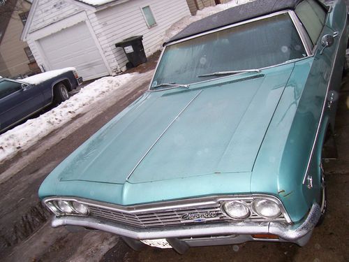 1966 chevrolet impala convertible. needs restoration but driven daily!