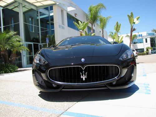 Maserati granturismo in black with rare rosso cora interior, as new!