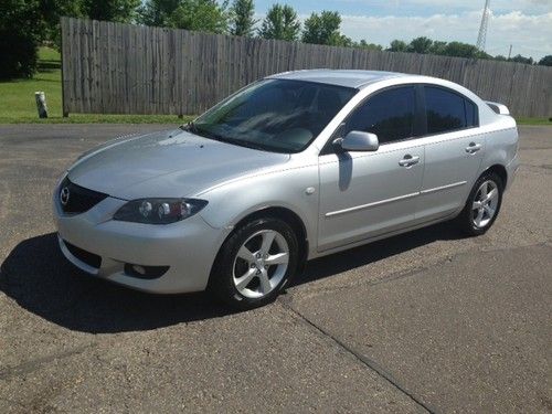 2004 mazda 3! great mpg! tint rims look!! no reserve!