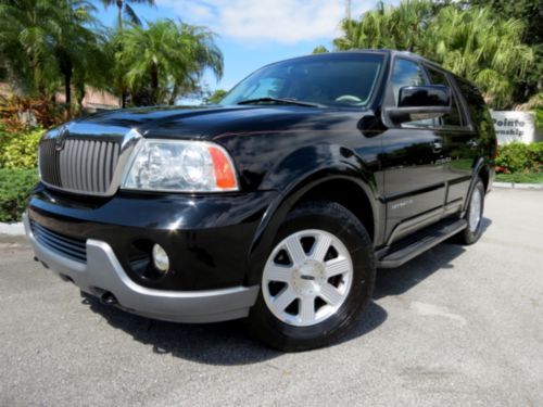 Onyx black 03 lincoln navigator premium-biscuit leather-2 adult owned-no reserve