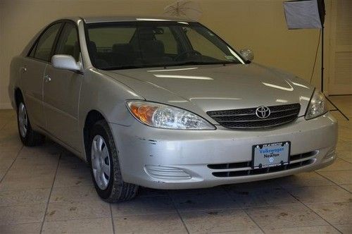 2004 silver toyota camry le  2.4l automatic hwy miles 134k excellent condition