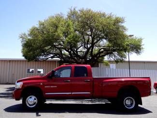 2006 red laramie dually 5.9l i6 4x4 heated seats we finance we want your trade