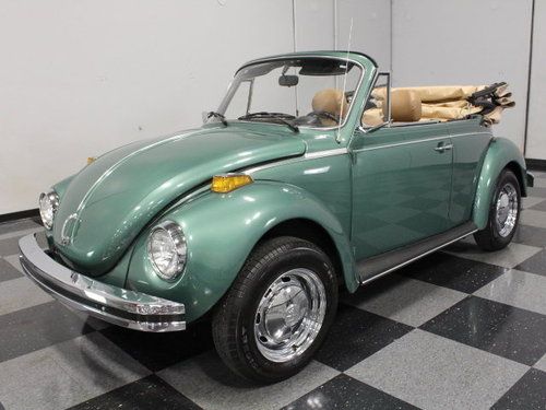 Nicely restored green over tan convertible, fresh top &amp; upholstery, chrome rims!