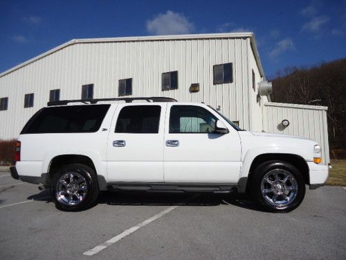 Suburban 4x4 1500 z71 white with tan leather 20 inch wheels , priced to sell !