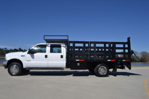 2004 ford f-550 crew cab flatbed liftgate diesel babied!!