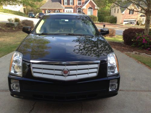 2006 cadillac srx sport utility with bose, xm, rear a/c and panoramic roof