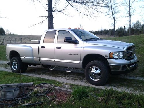 Silver 2005 dodge 3500 ram turbo diesel, club cab, automatic, leather, tow pack.