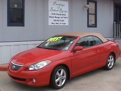 Convertible, leather seats, red exterior, tan interior, cd player, 6 cyl