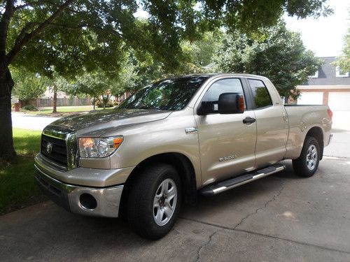 Excellent condition. gold; double cab; winch; tow pkg; reverse camera; leather
