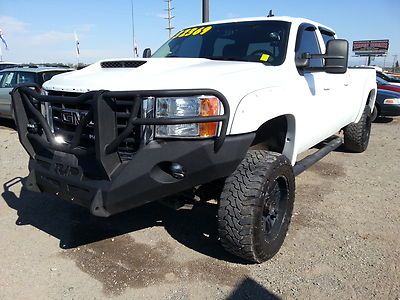 6" tuff country lift, 35" tires, dual exhaust, edge evolution chip
