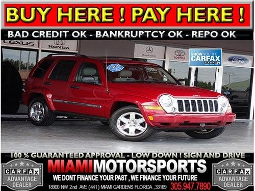 We finance '06 jeep suv 4x4 leather sunroof towing pkg and more....