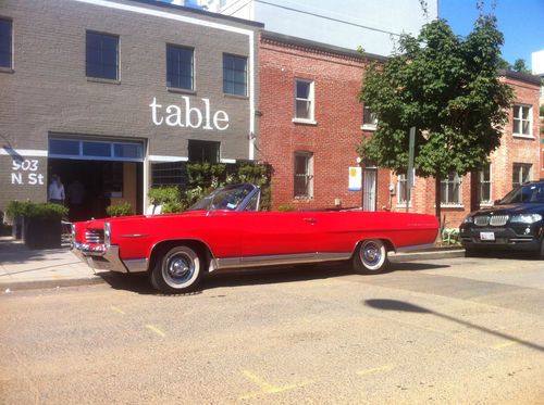 Beautiful red convertible with cold factory a/c