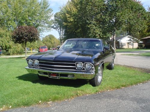 Stunning black!! 69 chevelle. w@w lazer straight &amp; shows like new inside &amp; out!!