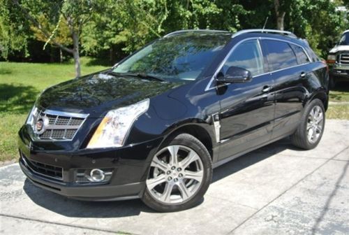 2012 black cadillac srx 3500 milles in brand new condition