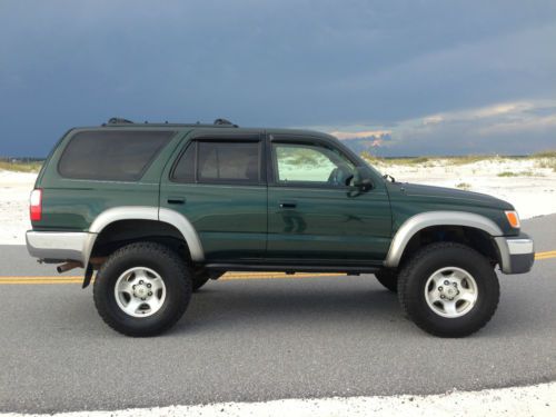 2002 toyota 4runner 4x4, lifted, leather, 4wd, and many more options!