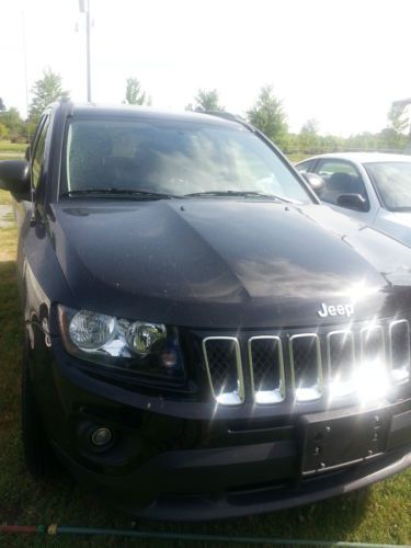 Black 4x4 2014 jeep compass with uvoice hands free controls touch screen display