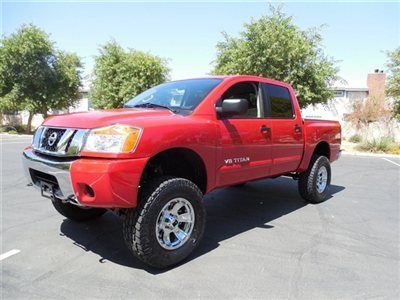 2012 lifted badboy nissan titan  with only 21000 miles