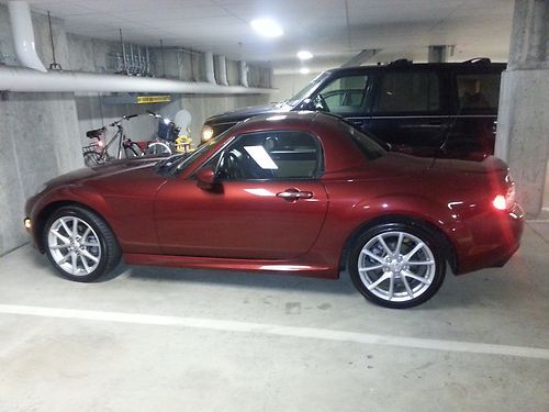 Grand touring hard top convertible 13000 miles