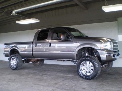 2006 ford f350 crew cab 4wd 6.0l diesel lifted 62k nice!!