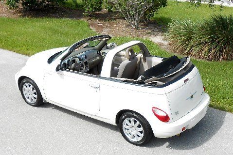 Touring convertible~2.4l turbo~cd~canvas power top~new tires~cool vanilla white~