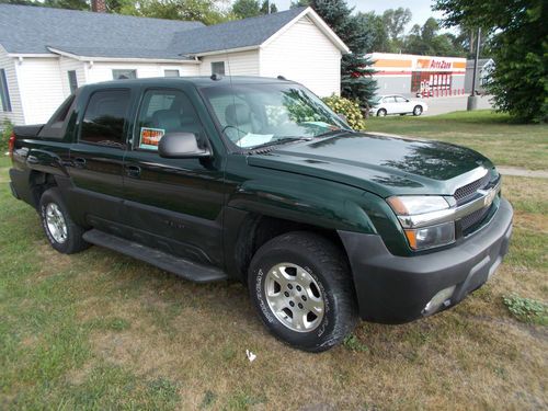 04 chevy medium green metallic  avalanche z71 off road. leather and loaded