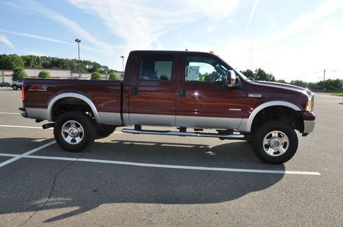 Lifted ford f-350 lariat fx4 crew cab turbo diesel no reserve clean 1 owner