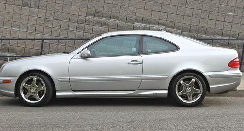 Silver metallic 2d coupe 2002 great condition leather seats, clean title