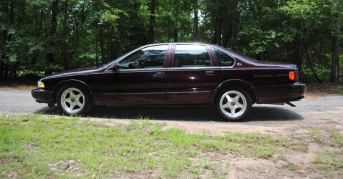 Clean clear title, 4 door, burgandy exterior, gray interior.  awesome car!!!!!!