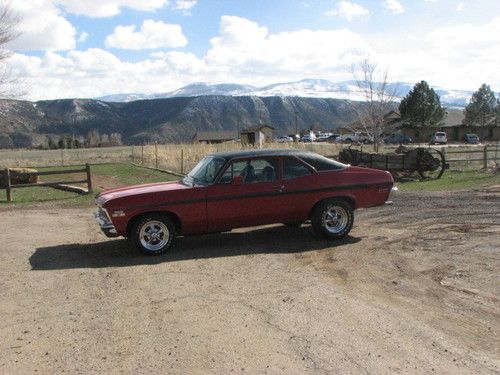 1972 chevy nova rally - beautiful red with black strips and black soft top