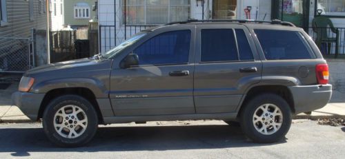 2000 jeep grand cherokee laredo *owners manual*  runs great!  23 hwy mpg