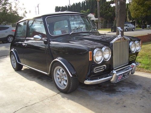 Classic black, newly painted, rolls roice conversion
