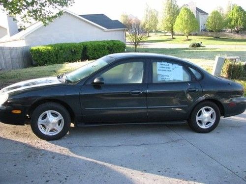 Dependable, affordable, luxury 1999 ford taurus se leather