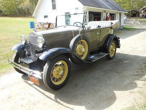 1930 model a ford phaeton standard 4 door.