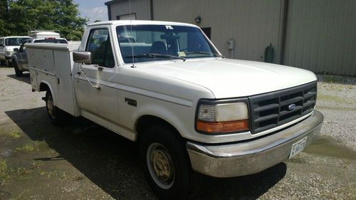 1997 ford f250hd service truck.  single axle. dual tanks. reading utility bed.