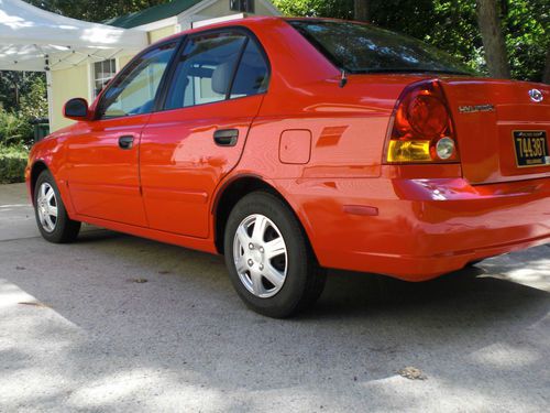 2004 hyundai accent sedan 4-door 1.6l (red)