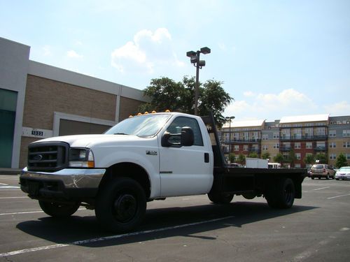 2001 ford f550 (not 450) flat bed 14ft by 8ft 7.3 diesel look!