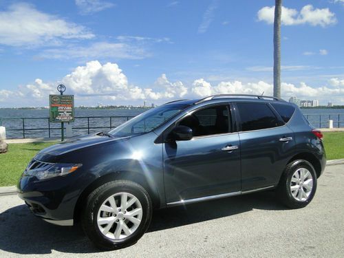 2013 murano sl awd ,leather, back up camera..only 8k miles ,warranty!