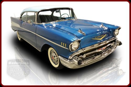 57 chevrolet bel air coupe  rebuilt 283 v8 three speed on the tree manual