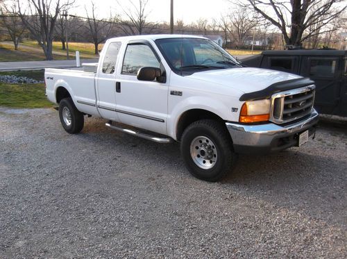 1999 ford f-250  7.3 diesel, 4x4, supercab, longbed, good solid truck.