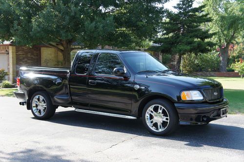 2000 harley f-150 ford with just 900 miles.