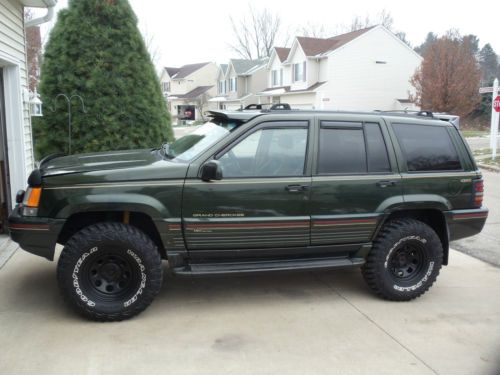 1995 jeep grand cherokee  lifted 2&#034; w/ 33 goodyear kevlar tires
