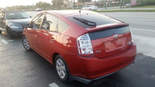 06 toyota prius  touring -  hybrid,  super clean,  clean history, red metallic