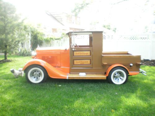 1928 chevy woody pickup truck ..a real eye catcher..