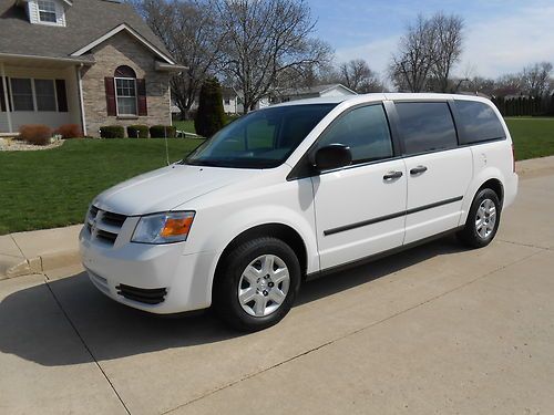 Grand caravan se 5 door stow and go seating one owner very clean a steal !