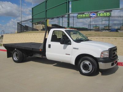 Look at this one owner single cab ford f-350  flate bed low miles only 88k