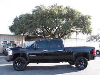 Lifted blacked out ltz dvd heated leather nav sunroof bose duramax diesel 4x4!