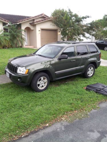 Dark green 2007 jeep grand cherokee laredo v6 for sale. one owner, clean title