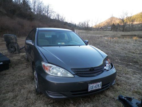 2003 toyota camry damage to left front otherwise very good shape