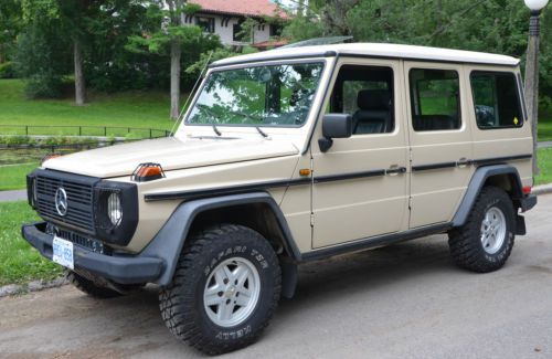 Mercedes g-wagon ge 280. tan exterior, black leather interior in great condition